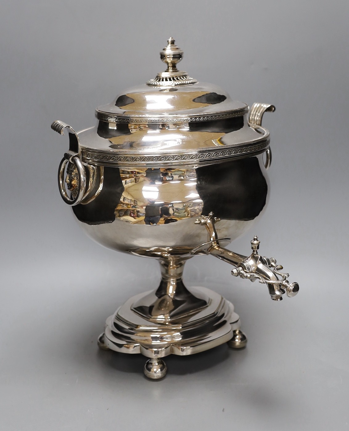 A 19th century silver plated tea urn, Egyptianesque handles, 43cm